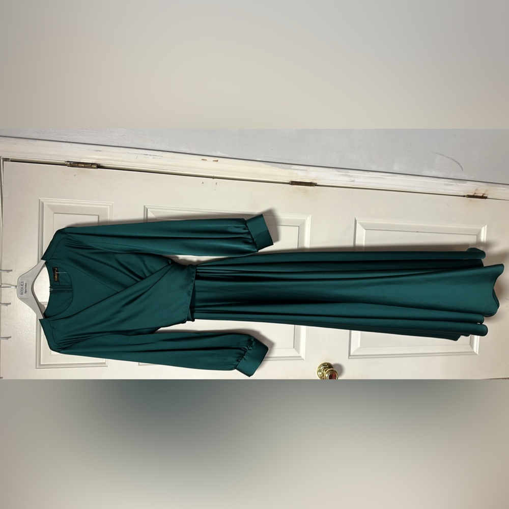 Green satin fully lined long sleeve maxi gown wrap around gown.